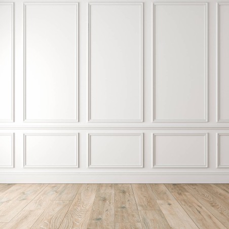 Sztukateria - listwy na białej ścianie